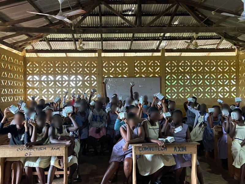 Young girls receiving support from the pad donation project
